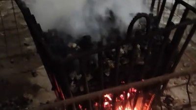 Kobieta pokazuje koksowniki na polskich ulicach. „Można się udusić, a nie ogrzać”